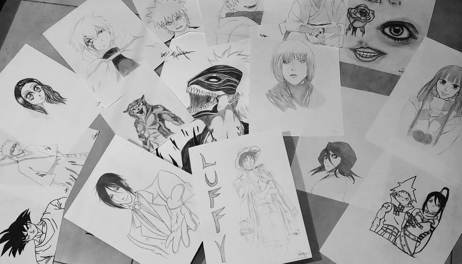 A spread of Mirian's graphite character drawings
